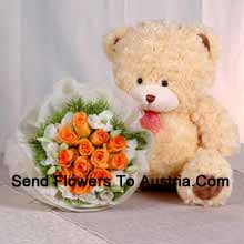 Bunch Of 11 Orange Roses And A Medium Sized Cute Teddy Bear Delivered in Austria