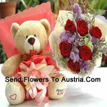 Bunch Of 7 Red Roses And A Medium Sized Cute Teddy Bear Delivered in Austria